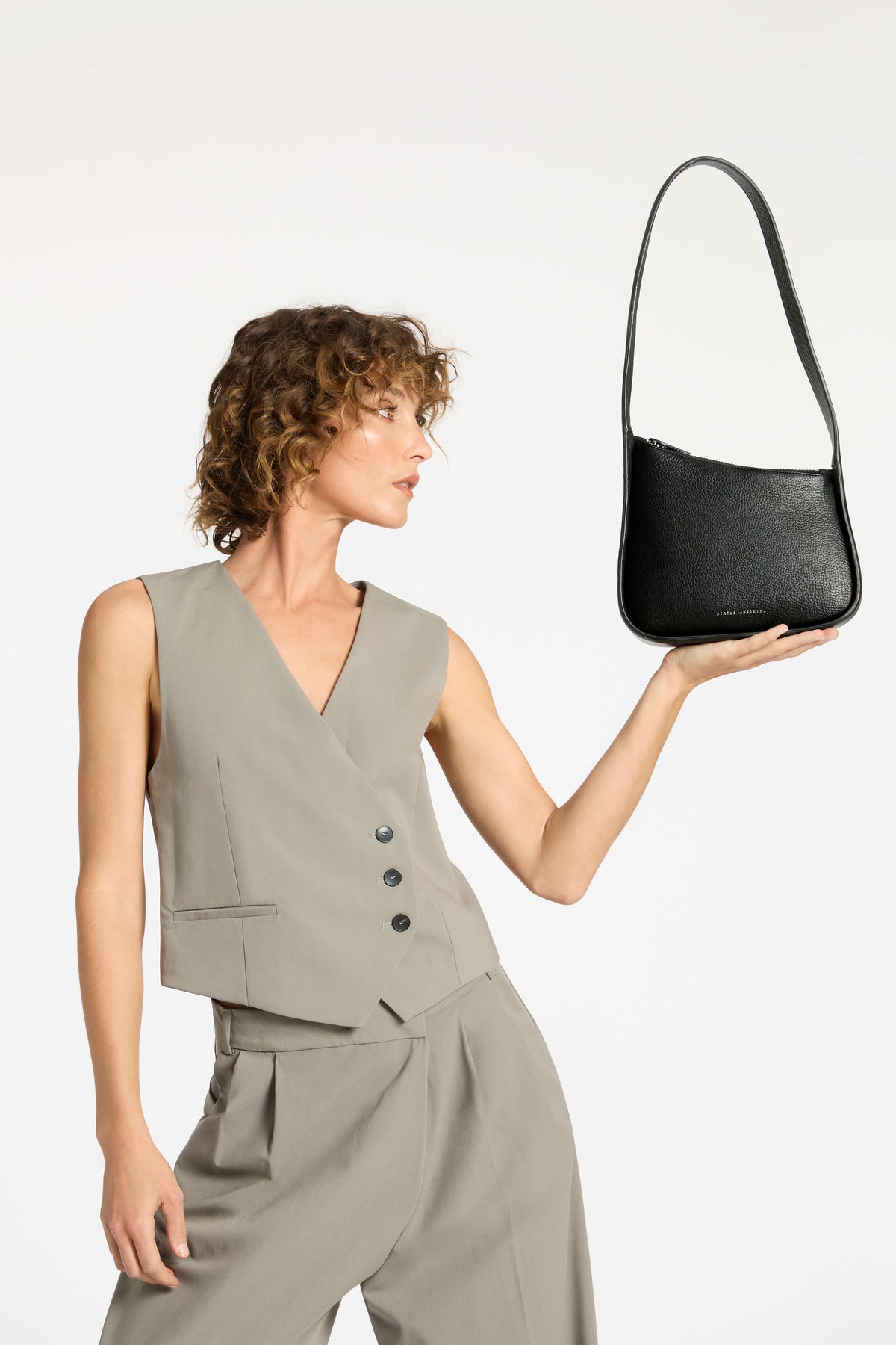 Sleek and structured. The Elijah Sling Bag will be your new