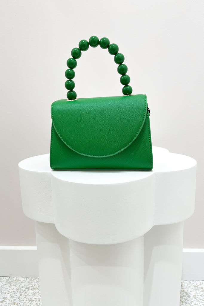 Green on sale clutch bags